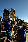 Myanmar - Kyaikhtiyo, porters carrying luggage's of the pilgrims. 